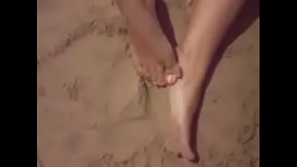 XXX foot fetish in the sand top Videos