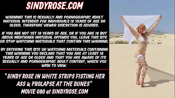 XXX Sindy Rose en bandes blanches fisting son cul et prolapsus dans les dunes meilleures vidéos